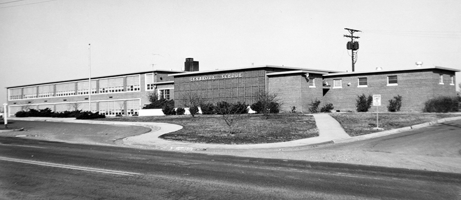 Black and white photograph of the front exterior of Lynbrook Elementary School taken from Backlick Road. The picture is believed to date from 1968.  