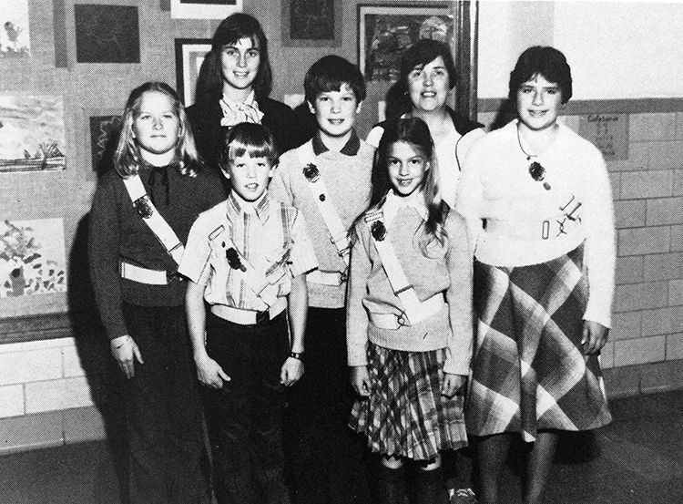 Black and white yearbook photograph, from 1981 to 1982, showing Lynbrook's Safety Patrol officers. Five children and two teacher sponsors are pictured.
