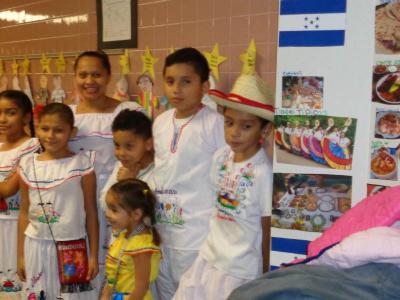 family with display at multicultural night